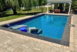 Rectangle with shallow sun ledge, auto cover and custom decking